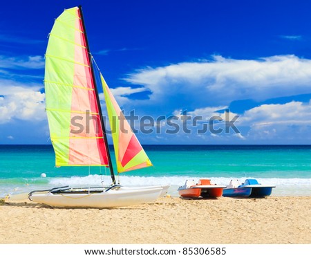 Catamaran and water bikes at the cuban beach of Varadero
