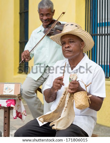 HAVANA,CUBA - JANUARY 15, 2014:Senior musicians playing traditional music.2 850 000 foreign tourists visited Cuba in 2013,many of them attracted by its distinct culture