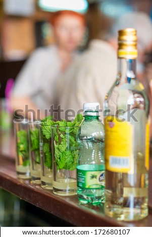 HAVANA,CUBA -?? JANUARY 20, 2014:Mojitos,a well known cuban cocktail being prepared at La Bodeguita del Medio.This world famous restaurant was a favorite of celebrities such as Ernest Hemingway