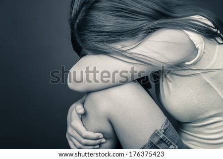 Dramatic Image Of A Sad Teenage Girl Crying