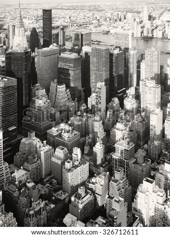Black and white aerial view of skyscrapers at midtown New York City