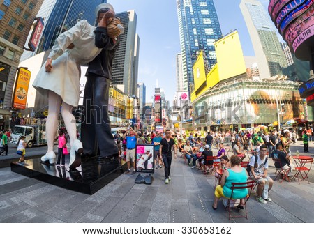 NEW YORK,USA - AUGUST 14,2015 : Tourists at Times Square in New York City