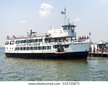 NEW YORK,USA - AUGUST 16,2015 : Statue cruises boat docked at Liberty Island in New York City