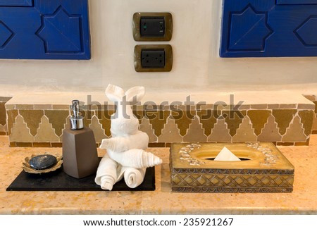 Tissue box, Towel, Hand Gel and Soap in Luxury Bathroom