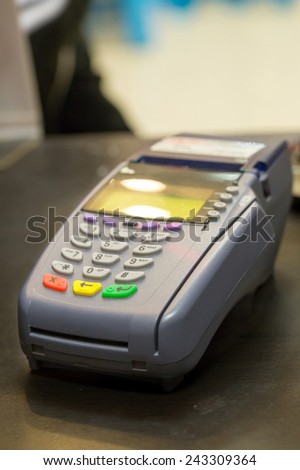 Credit Card Machine on cashier counter in the store : Selective Focus