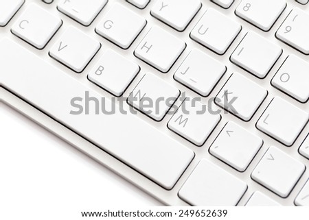 close-up of white computer keyboard on a white background