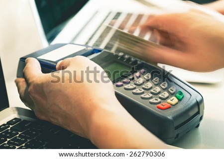 Hand Swiping Credit Card In Store : Still-Life Processed