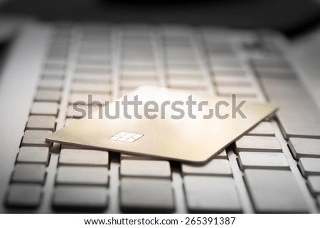 Electronic Chip on Credit card : Concept of online shopping (Selective Focus)