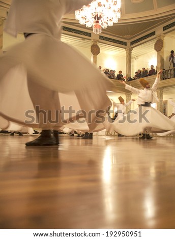 ISTANBUL, TURKEY - MARCH 15: Whirling Dervishes in Yenikapi Mevlevihanesi in Istanbul, Turkey on March 15, 2014.