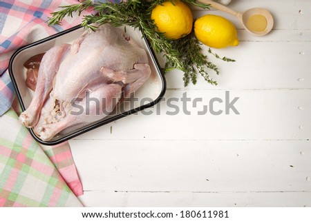 Turkey, lemon, rosemary, thyme and honey before cooking