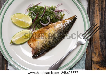 Grilled mackerel fillet with seaweed salad, sesame and lime