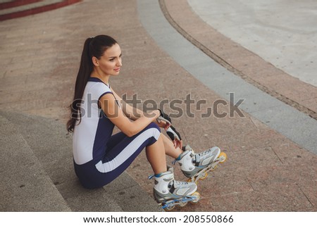 Young woman on roller skates