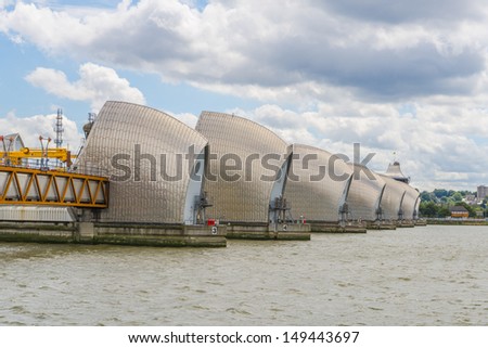 LONDON - AUG 4 : Thames Barrier, tidal protector, commissioned by the Greater London Council, operational since 1982, is world\'s second largest movable flood barrier, on August 4, 2013 in London, UK.
