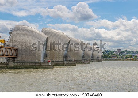 LONDON - AUG 4 : Thames Barrier, tidal protector, commissioned by the Greater London Council, operational since 1982, is world\'s second largest movable flood barrier, on August 4, 2013 in London, UK.