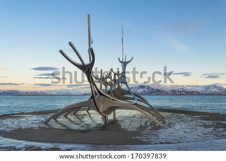 REYKJAVIK, ICELAND - JAN 5: Sculpture of Solfar or Sun Voyager by the sea in the center of Reykjavik, Iceland on on January 5, 2014. Designed by Jon Gunnar Arnason in stainless steel in 1971.