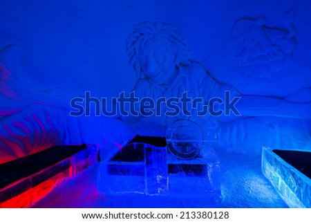 YLLASJARVI, FINLAND - FEB 27, 2014: Ice hotel suite in Lainio snow village in Yllasjarvi, Finland. The snow village is open every year from December/January until the end of April.