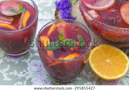 Refreshing red sangria with orange juice and fruit