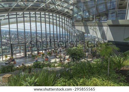 LONDON, UK - JULY 4, 2015: The Sky Garden at 20 Fenchurch Street is a unique public space designed by Rafael Vinoly Architects. It features a stylish restaurant; brasserie and cocktail bar