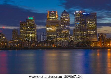LONDON, UK - AUGUST 22, 2015: Night view of Canary Wharf, a major business district located in London, UK. It\'s a home to the headquarters of numerous major banks and other professional service firms