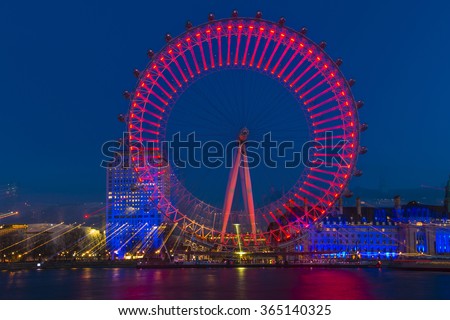 LONDON - JANUARY 16, 2016: Night shot of the London Eye with zoomed effect. The London Eye is a giant Ferris wheel on the South Bank of the River Thames and offers a great viewing point over London