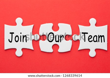 Join Our Team text in 3 pieces paper puzzle on red background. Business Concept