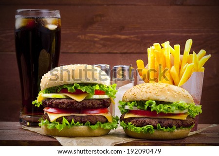 [Obrazek: stock-photo-two-hamburgers-with-fries-an...090479.jpg]
