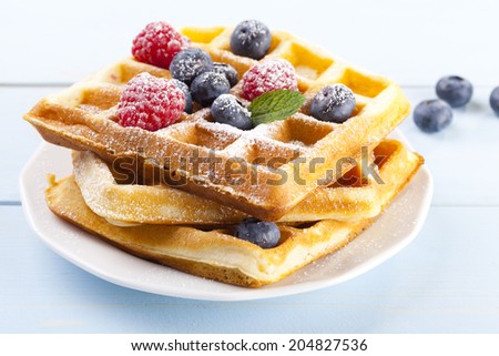 Homemade waffles with fruit and / or whipped cream
