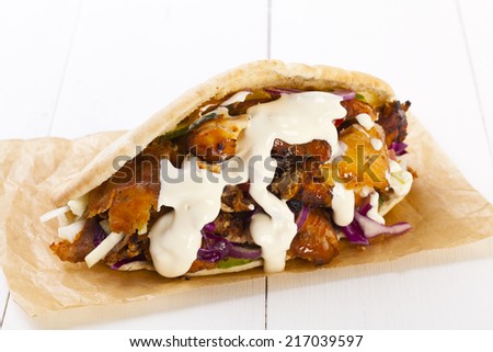 Chicken Kebab in a bun with garlic sauce