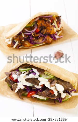 Beef and Kebab in a bun with garlic sauce