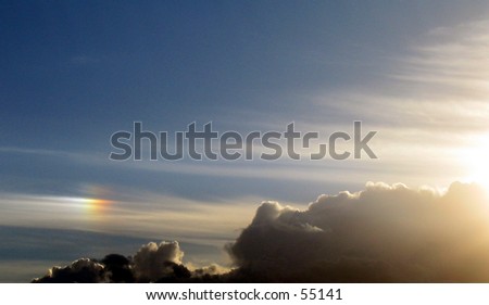 Sun dog: a common atmospheric effect causing rainbow-like light refractions.