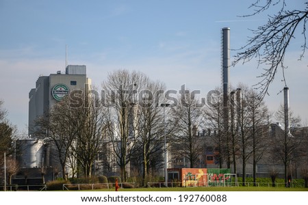 Zoeterwoude Rijndijk, The Netherlands - March 8, 2014: Heineken brand name on top of the main building at the production facility of Heineken beer in Zoeterwoude Rijndijk, The Netherlands.