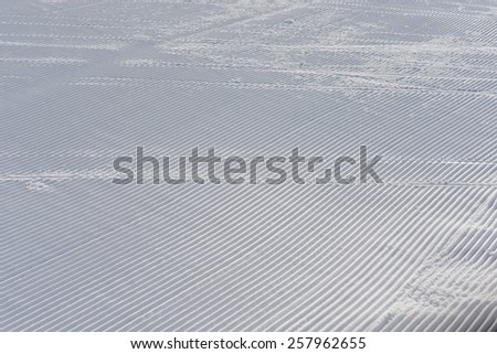 Texture of worked on snow by snow machine