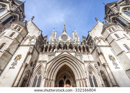LONDON, UK - OCTOBER 25, 2015: Known as The Law Courts, The Royal Courts of Justice houses the High Court and Court of Appeal of England and Wales. Many high profile cases have been carried out here.