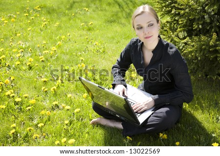Young Lady Working Outside On Laptop Computer