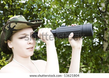 Young Woman Looking Through Binoculars