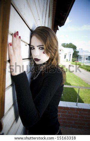 Beautiful Gothic Girl Near A Wall