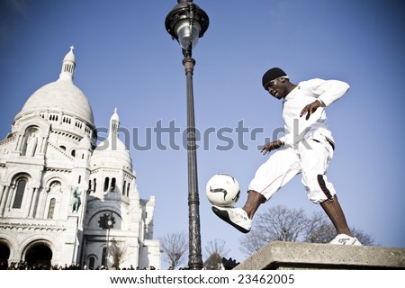 FRANCE, PARIS - DECEMBER 28: STREET SHOW, Iya Traore - Football Freestyler for the top event for the for the trade and user at the Montmartre District, December 28, 2009 in Paris, France.