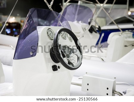 Boat Inside View: Wheel And Control Panel