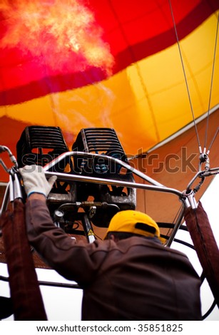 Pilot Turning On The Fire Inside The Air Balloon