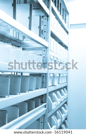 Wall of Gray Metal Filing Cabinets Drawers