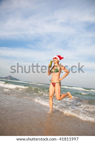 Funny Woman Dancing On The Beach. Christmas Collection