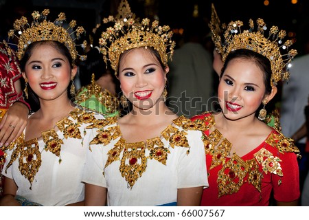 stock photo : HUA HIN, THAILAND - NOVEMBER 21: Dancers in colorful costume. Thai people float on water a small rafts (Krathong) to celebrate the Loy Krathong festival. November 21, 2010 in Hua Hin, Thailand.