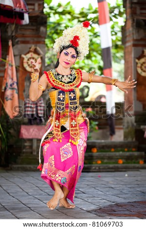 BATUBULAN, BALI, INDONESIA- JUNE 23: Unidentified woman dance for tourists at the weekly  Barong Dance, the traditional balinese performance on June 23, 2011 in Batubulan, Bali, Indonesia.