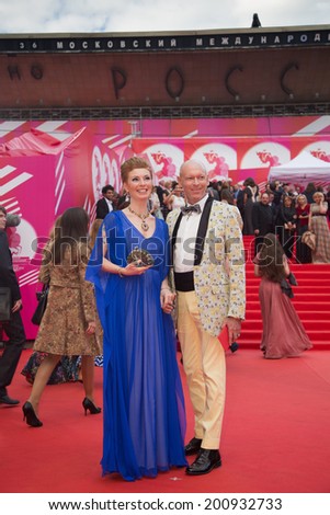 MOSCOW - JUNE, 19: Russian actress Amalia Mordvinova with friend. 36th Moscow International Film Festival. Opening Ceremony at Pushkinsky Cinema . June 19, 2014 in Moscow, Russia