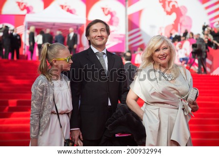 MOSCOW - JUNE, 19: Russian actress I. Miroshnichenko with family. 36th Moscow International Film Festival. Opening Ceremony at Pushkinsky Cinema . June 19, 2014 in Moscow, Russia