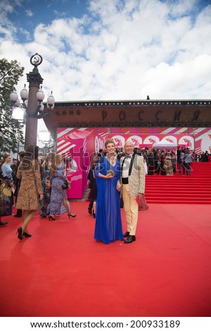 MOSCOW - JUNE, 19: Russian actress Amalia Mordvinova with friend. 36th Moscow International Film Festival. Opening Ceremony at Pushkinsky Cinema . June 19, 2014 in Moscow, Russia