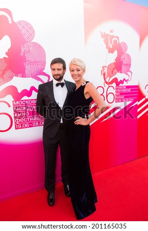 MOSCOW - JUNE, 19: Russian actress E. Volkova with friend. 36th Moscow International Film Festival. Opening Ceremony at Pushkinsky Cinema . June 19, 2014 in Moscow, Russia