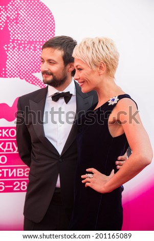 MOSCOW - JUNE, 19: Russian actress E. Volkova with friend. 36th Moscow International Film Festival. Opening Ceremony at Pushkinsky Cinema . June 19, 2014 in Moscow, Russia