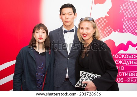MOSCOW - JUNE, 28: Russian actor E. Sangadzhiev (White Yagel movie) with friends. 36st Moscow International Film Festival. Closing Ceremony at Rossiya Cinema . June 28, 2014 in Moscow, Russia
