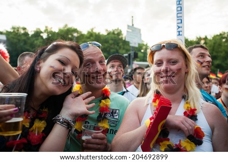 BERLIN - JUNE, 22: Unknown german fans celebrating football game on Euro 2012 near Brandenburger Tor. June 22, 2012 in Berlin, Germany